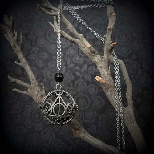 Collier pendentif cage...